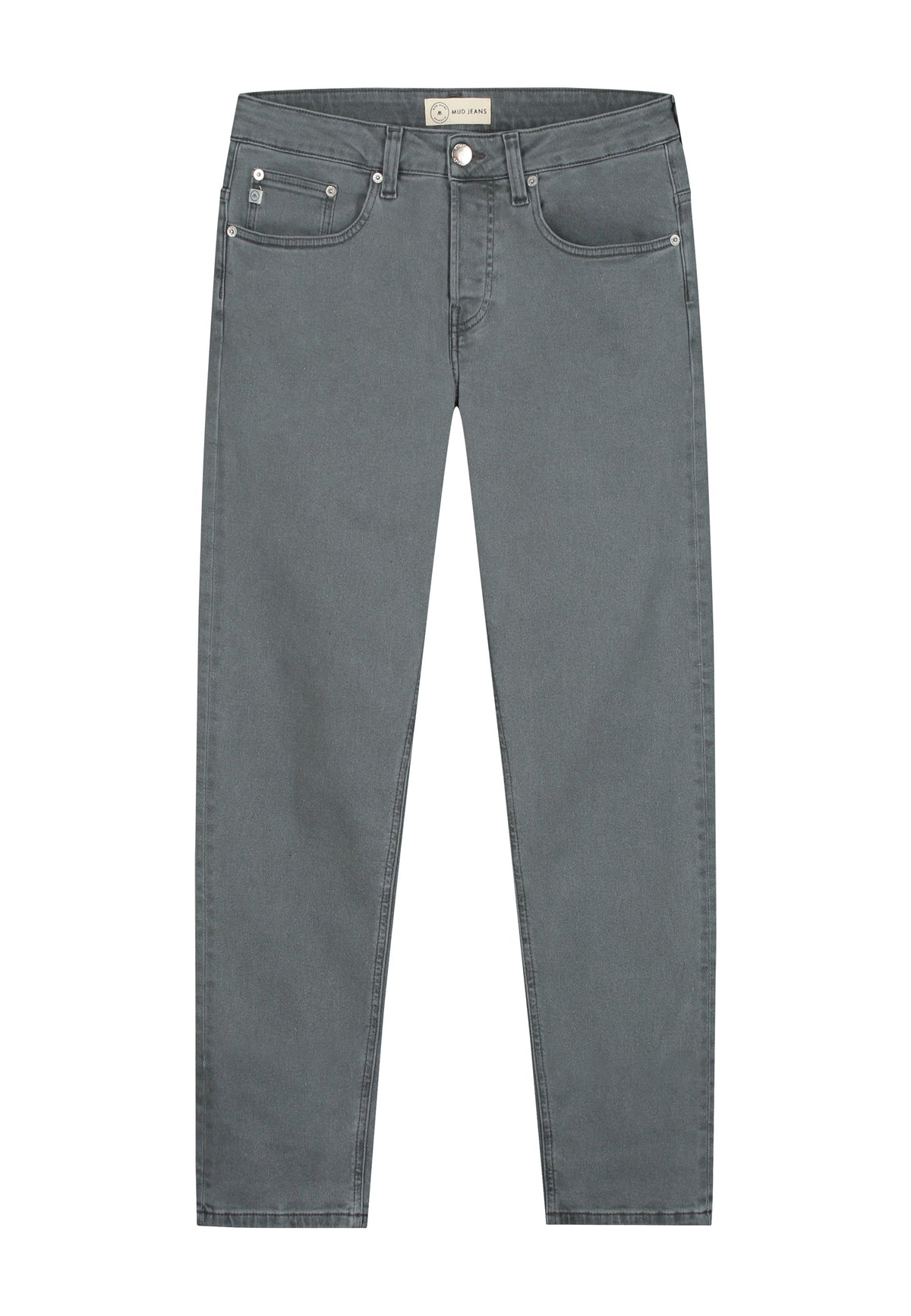 Sustainable Mud Jeans in deep blue denim crafted ethically, featuring a slim fit, paired with beige suede sandals.