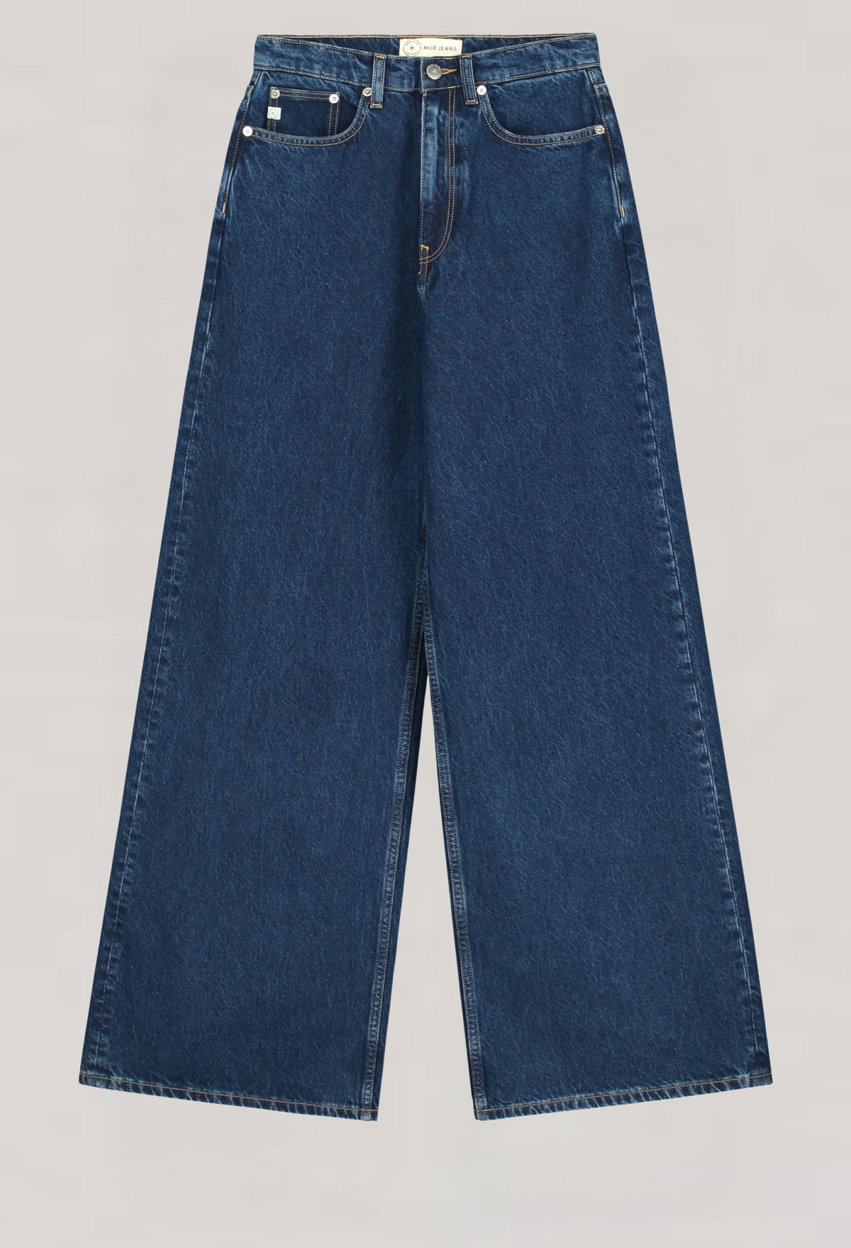 Wide-leg sustainable jeans in dark blue denim, showcasing eco-friendly MUD Jeans fabric with classic five-pocket design.