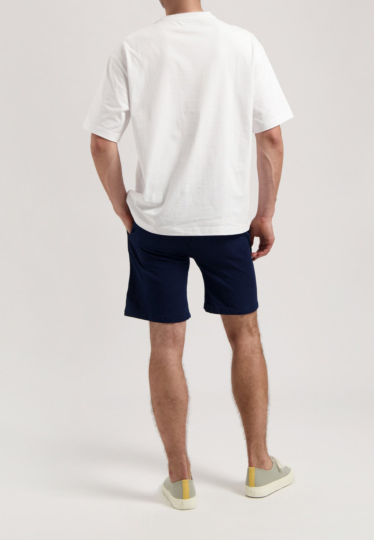Sustainable MUD Jeans in light blue denim featuring back pocket details, crafted with ethical and eco-friendly materials.