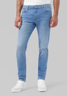 Sustainable MUD Jeans deep blue denim shirt made from organic cotton with classic button-up design and chest pocket.