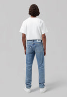 Sustainable MUD Jeans in light blue denim, crafted from organic cotton, showcasing a classic five-pocket design.
