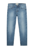 Sustainable dark wash MUD Jeans crafted from organic cotton, featuring a classic fit, styled with white sneakers.