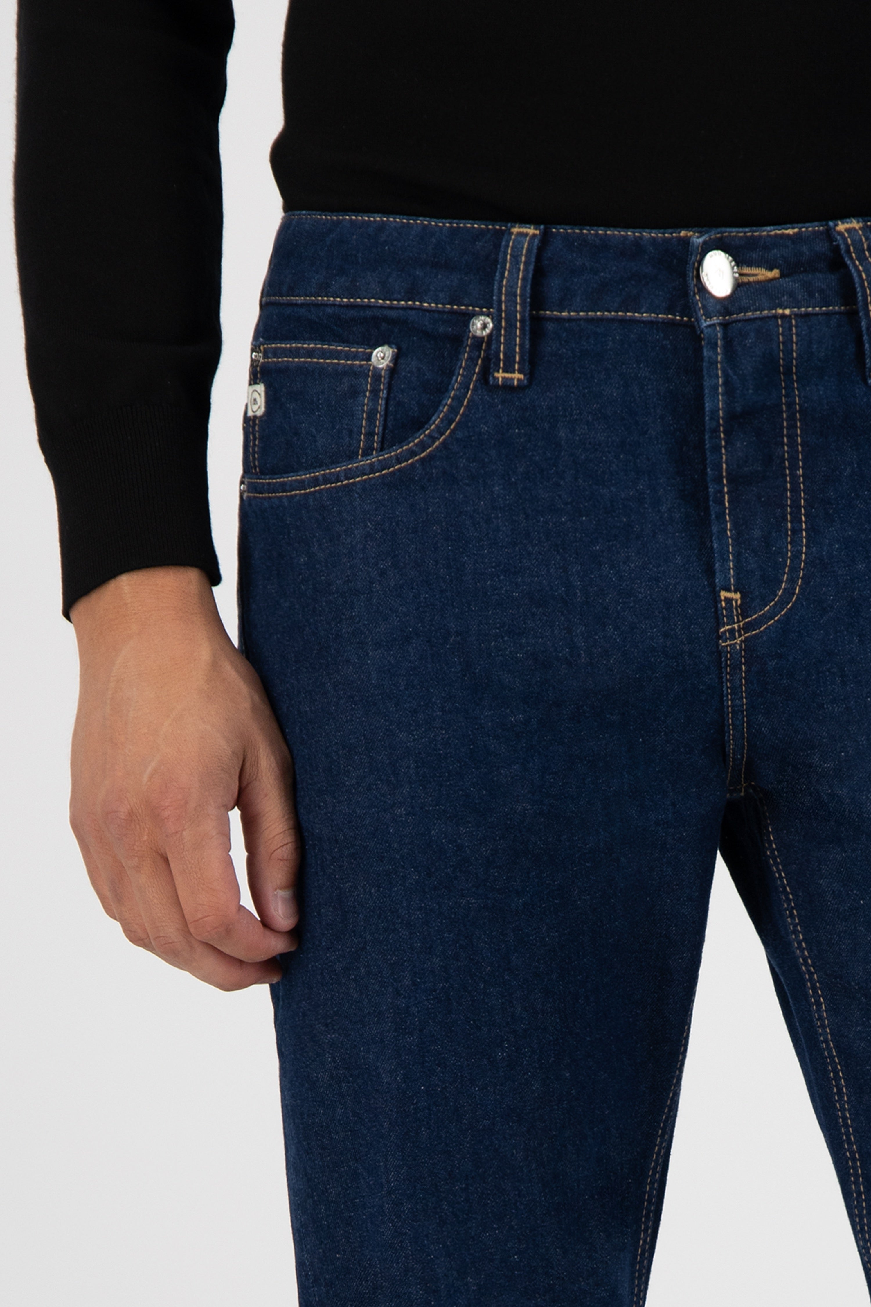 Eco-friendly Mud Jeans tote in dark blue denim with circular logo, crafted from sustainable materials, promoting ethical fashion.