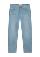 Sustainable MUD Jeans in dark blue denim with cargo pockets, paired with a black tank top for an ethical style statement.