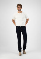 Sustainable MUD Jeans in dark blue denim, crafted ethically with organic cotton, featuring a straight leg fit.