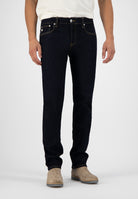 Sustainable MUD Jeans crafted in light blue denim, showcasing a classic fit and ethical fashion choice.