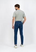 Sustainable MUD Jeans in light blue denim, featuring a classic fit, crafted ethically from organic materials.