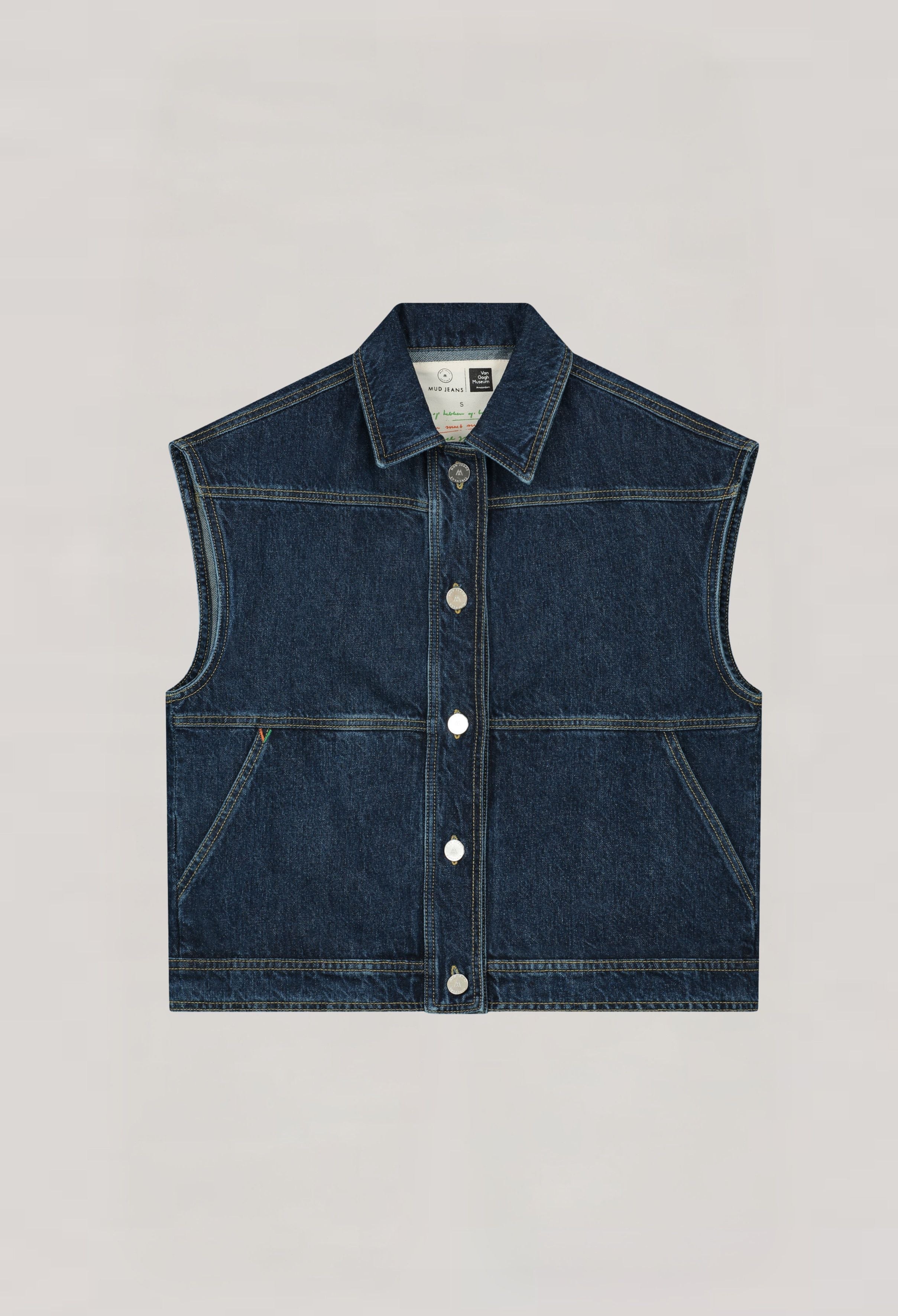 Denim MUD Jeans vest with button-up front, sleeveless design, and pointed collar on neutral background.