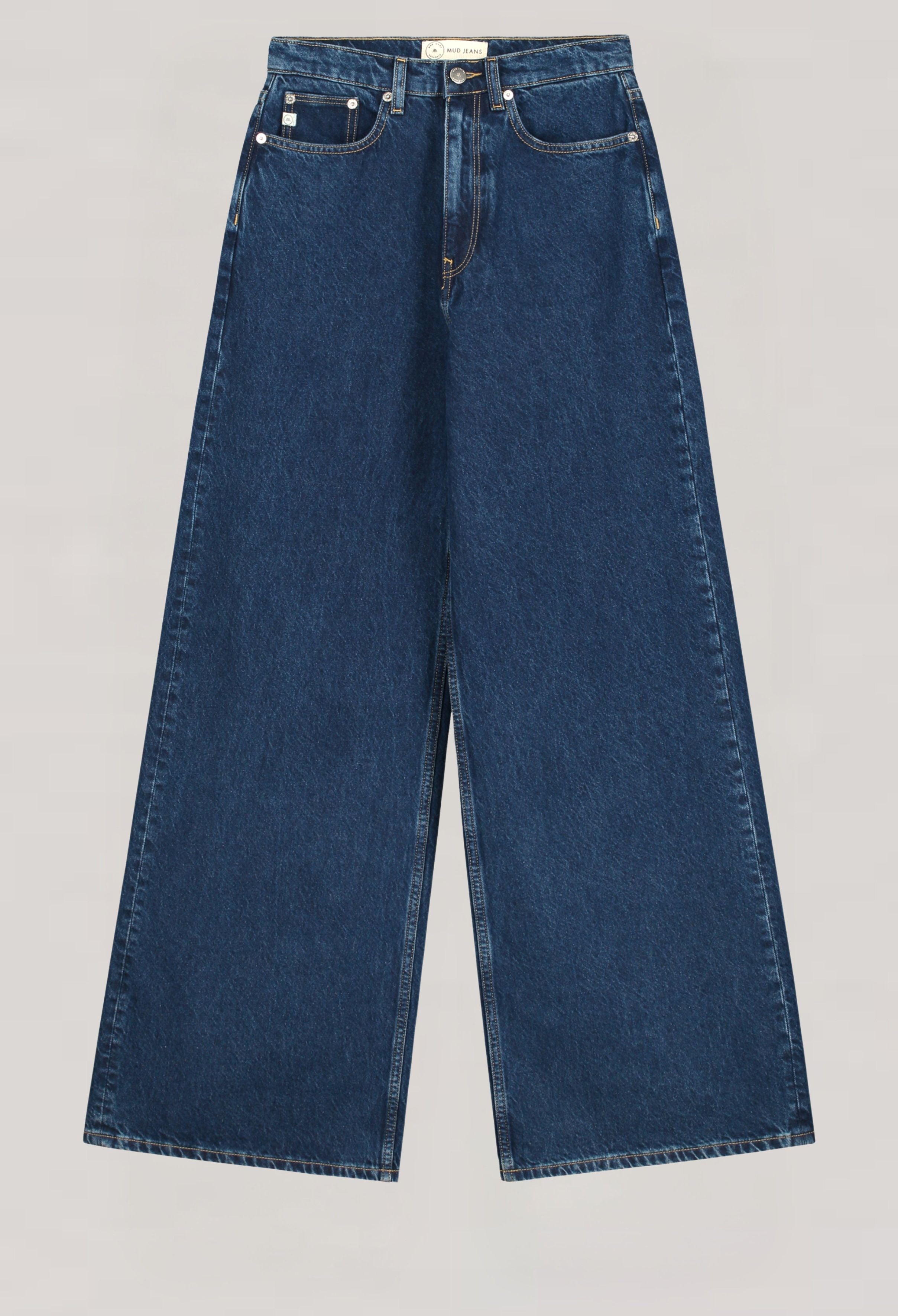 Wide-leg sustainable jeans in dark blue denim, showcasing eco-friendly MUD Jeans fabric with classic five-pocket design.