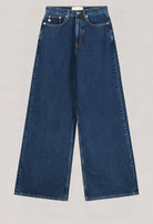 Wide-leg sustainable jeans in dark blue denim, showcasing eco-friendly MUD Jeans fabric with classic five-pocket design.