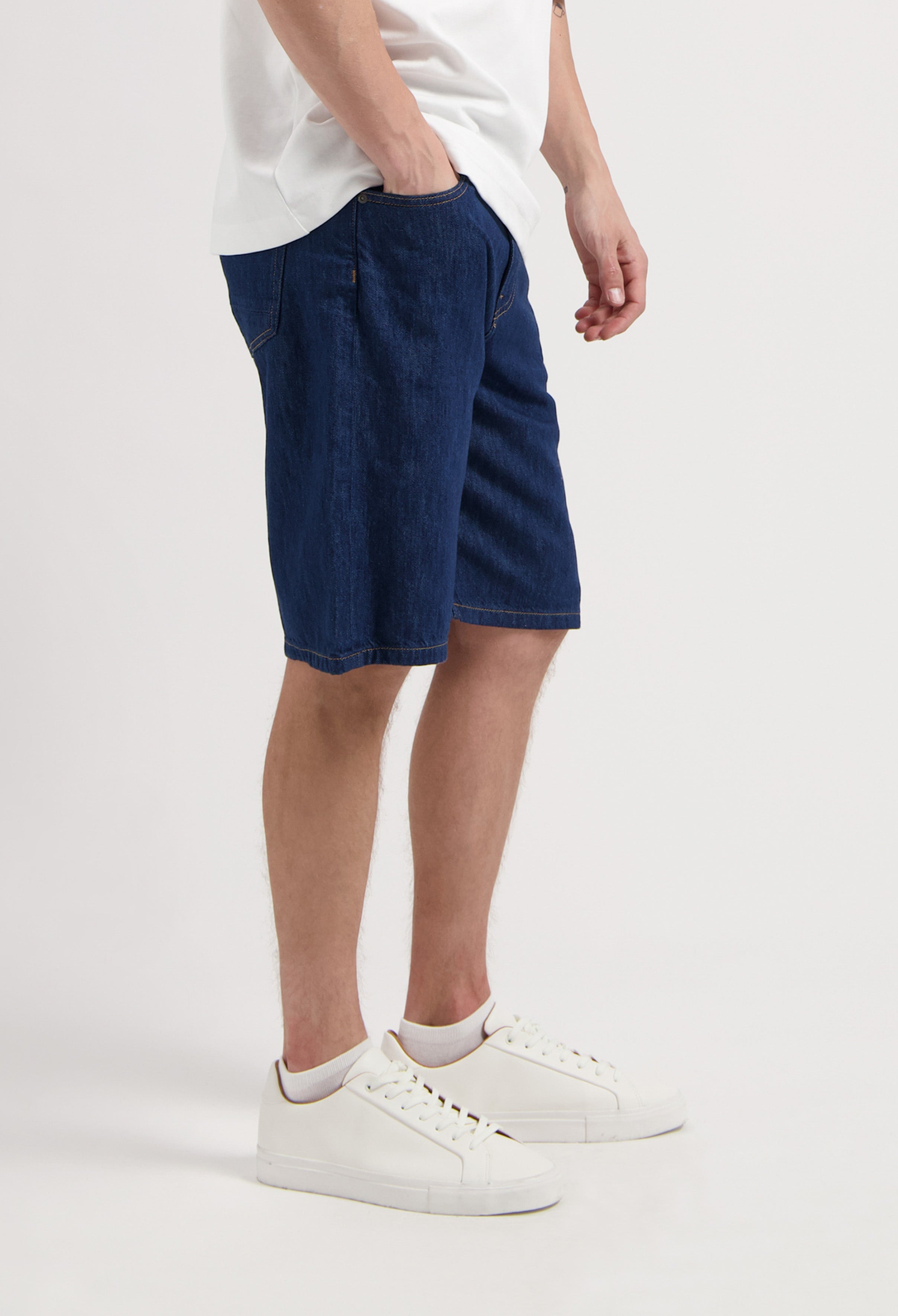 Sustainable MUD Jeans in light blue denim, crafted with organic cotton, showcasing an ethical classic fit from the back.